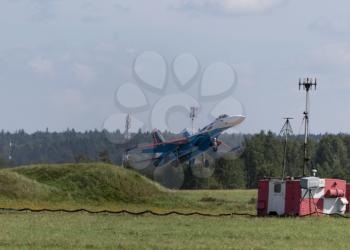 Moscow Russia Zhukovsky Airfield 31 August 2019: The Russian Knights Russkie Vityazi aerobatic team performs a demonstration flight with aerobatics figures of the international aerospace salon MAKS-2019.