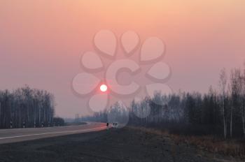 Road to Siberia in winter sunset.