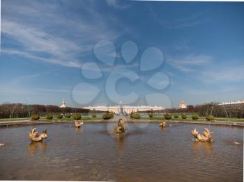 ST. PETERSBURG, RUSSIA, May 10, 2018: The Petergof or Peterhof, known as Petrodvorets from 1944 to 1997 and Neptune Fountain on May 10, 2018 in St. Petersburg, Russia