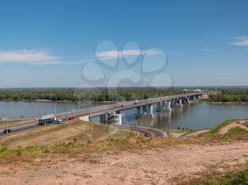 Bridge with cars at the entrance to Barnaul Russia.