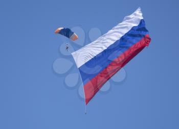 Moscow Russia Zhukovsky Airfield 31 August 2019: Parachute performances, demonstration performances with flag of Russia the international aerospace salon MAKS-2019.