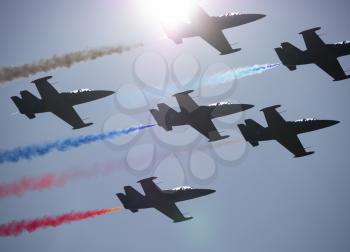 Flight of the aerobatic group Rus in the sky.