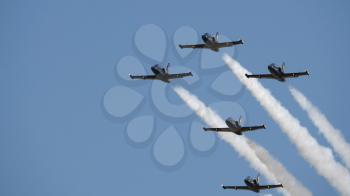 Flight of the aerobatic group Rus in the sky.