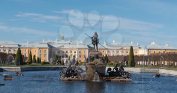 ST. PETERSBURG, RUSSIA, May 12, 2018: Time lapse Petergof or Peterhof, known as Petrodvorets from 1944 to 1997 and Neptune Fountain on May 12, 2018 in St. Petersburg, Russia.