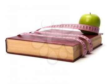 tape measure wrapped around book isolated on white background