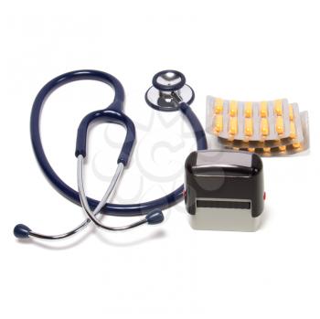 stethoscope, tablets  and doctor seal isolated on white background