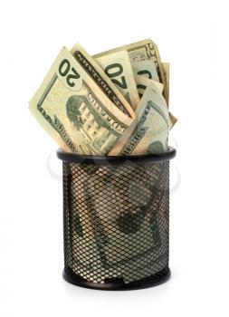 Waste of money concept. Dollars in garbage bin isolated on white background.