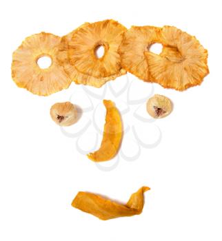 human face imitation with dried fruits isolated on white background