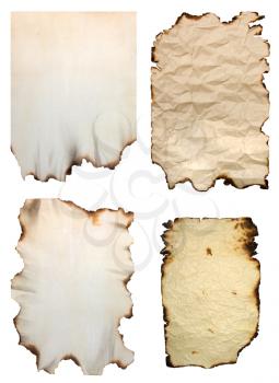 Collection of burnt vintage paper isolated on white