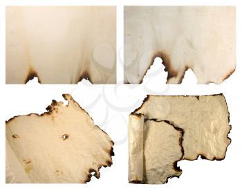 Collection of burnt vintage paper isolated on white