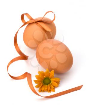 Easter eggs with festive bow isolated on white background