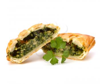 Puff pastry isolated on white background. Healthy pasty with spinach.