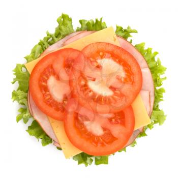 Healthy open sandwich with lettuce, tomato, smoked ham and cheese isolated on white background