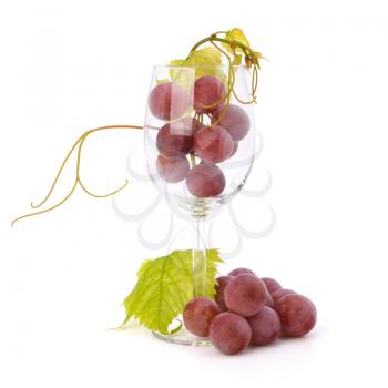wine glass full with grapes  isolated on white background