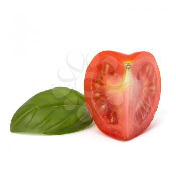 Tomato vegetable segment and basil leaf isolated on white background
