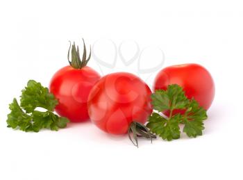 Small cherry tomato and parsley spice  on white background close up