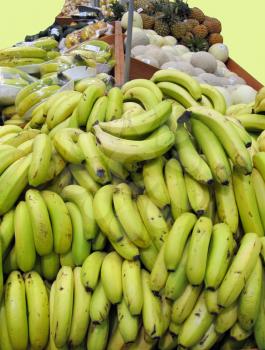 Royalty Free Photo of a Fruit Stand With Bananas