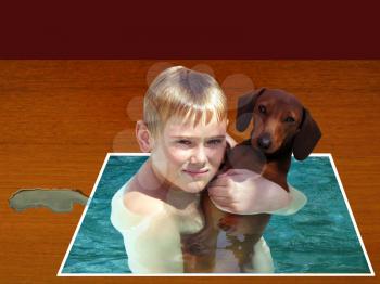 Royalty Free Photo of a Boy Swimming With His Dachshund