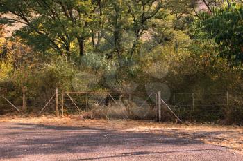 Royalty Free Photo of a Rural Farm Road Gate