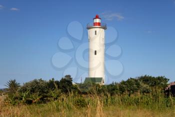 Picture of a Lighthouse During Daytime and Blue Skies
