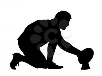 Royalty Free Clipart Image of a Rugby Goal Kicker Placing the Ball