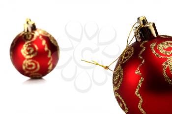 red ball decoration for a ?hristmas tree isolated on white background