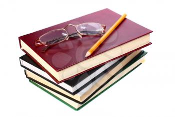 books is glasses and pencil isolated on white background