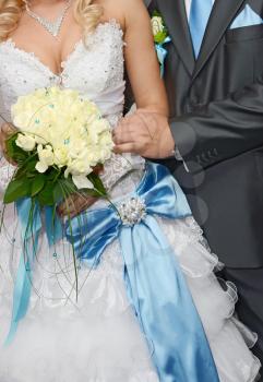 bride is a groom and wedding bouquet