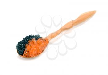 caviar black and red is in a wooden spoon isolated on white background