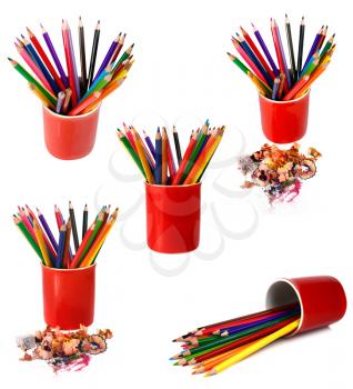 coloured pencils are in red glass isolated on white background