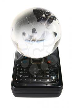 glass globe on a mobile telephone isolated on white background