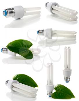 lightbulb and green leaf isolated on white background