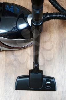 vacuum cleaner on a wooden floor