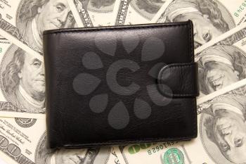 Black purse with money. 