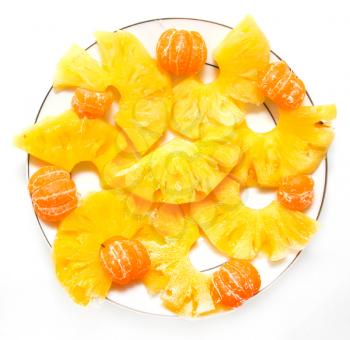 tangerines with pineapple on a white background