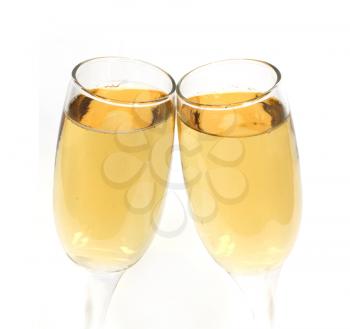 Pair of champagne glasses making a toast