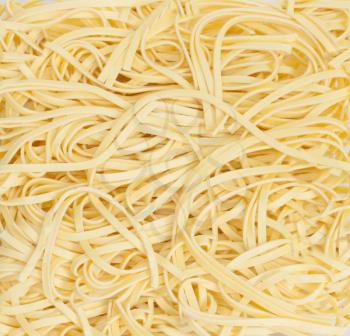 Scattered short noodles background 