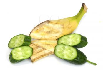 sliced ​​cucumber and banana on white background