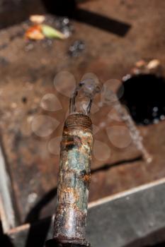old rusty tap water