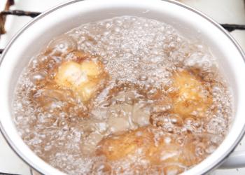 New potatoes simmering in boiling water 