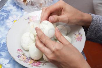 cleaning hands a boiled egg