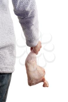 chicken leg in hand