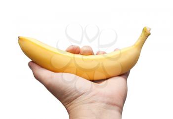 a banana in his hand on a white background
