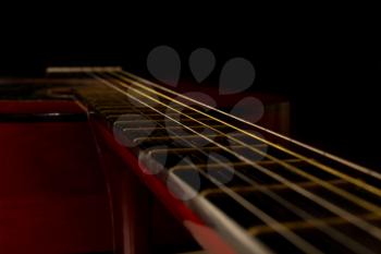 classical guitar on black background 