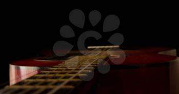 classical guitar on black background 