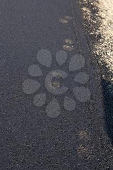 human footprints on the pavement