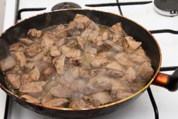 fried liver in a pan