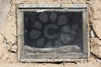 window in the clay wall
