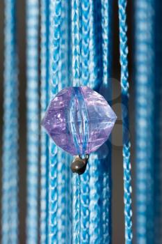 diamond on a blue curtain. macro