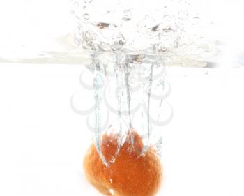 Mandarin falls in water on a white background